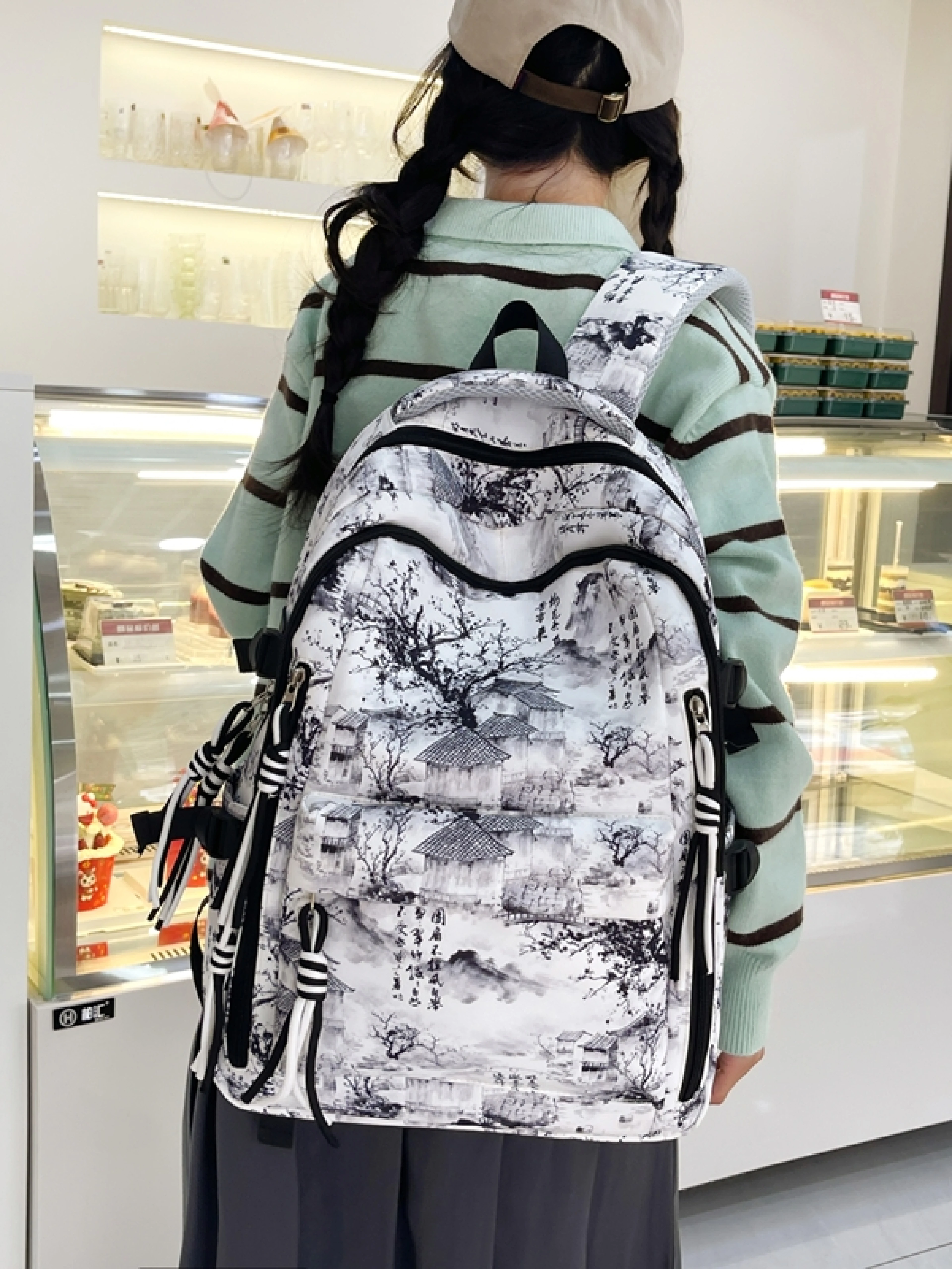 涂鸦花料新款大容量双肩包大学生背包小清新国风男女同款书包