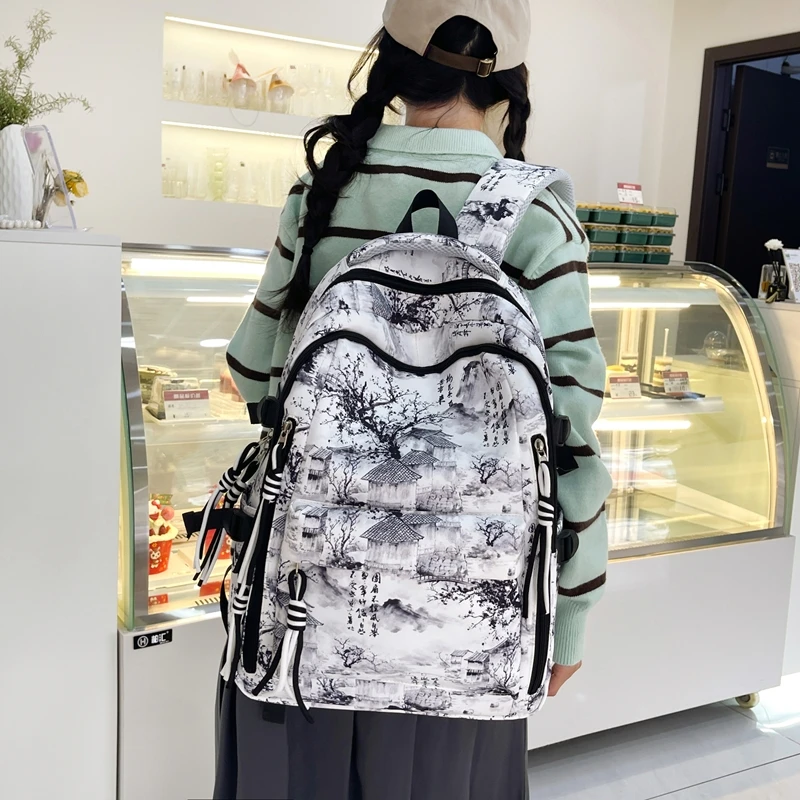 涂鸦花料新款大容量双肩包大学生背包小清新国风男女同款书包